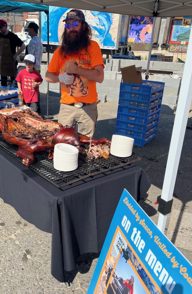 Tank Jackson prepares whole hog barbecue for the Carolina BBQ Festival