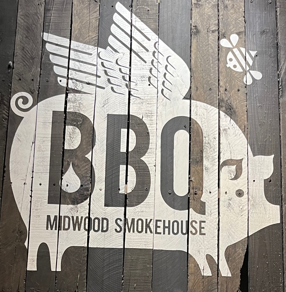 Sign for Charlotte barbecue restaurant Midwood Smokehouse.