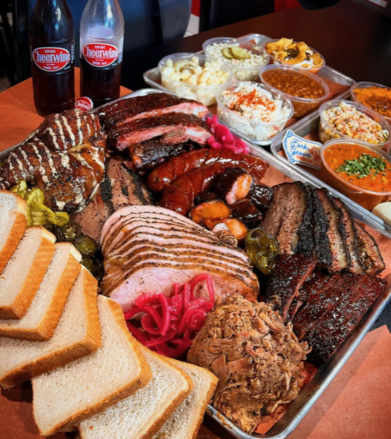 Fork Grove Barbecue meat tray with sides.