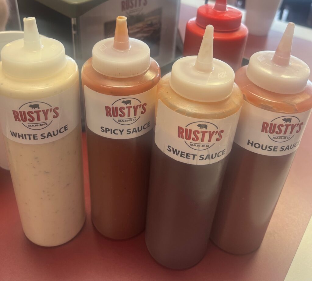 The selection of barbecue sauces at Rusty's Nar-B-Q in Leeds, AL.