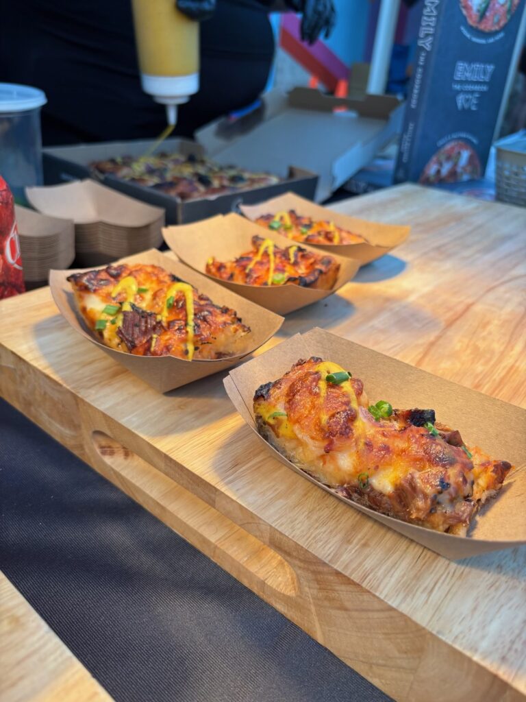 Detroit-style deep dish pizza was a collaboration between Emmy's Squared Pizza and Sweet Lew's BBQ at the kickoff for the 2025 Carolina BBQ Festival.
